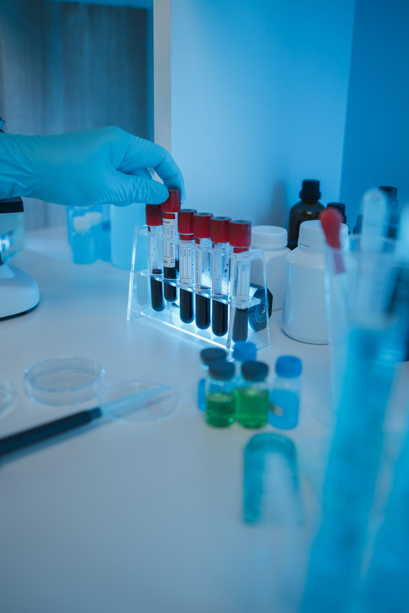 working atmosphere in the laboratory, chemistry and science specialist working in a lab with various experimental equipment and substances, experimental professional working in the lab